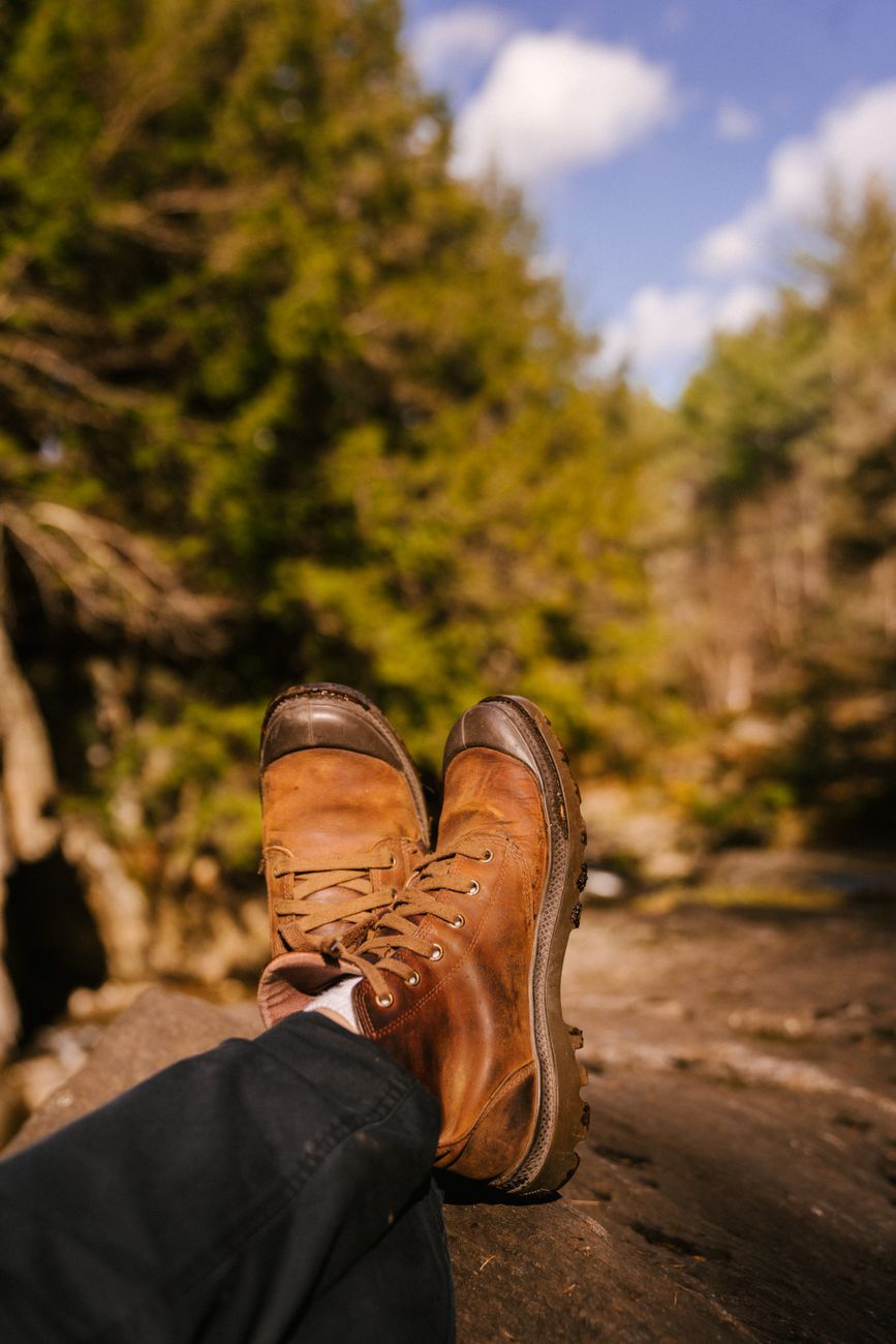 Hiking boots and backpack outdoor equipment